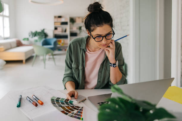 istock Interior designer choosing the right color for interior 1163926059
