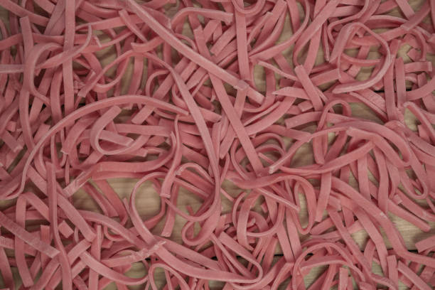 istock Home tomatoes red noodles on a wooden table background. 1163926614