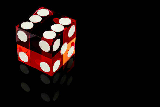 istock Dice red deluxe perfect close-up with copy space. Six, with reflection, isolated on black background, macro shooting. 1163927439
