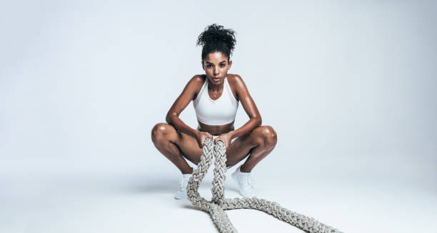 istock Fitness woman taking rest after intense workout 1163928786