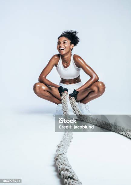 Woman Relaxing During Workout Stock Photo - Download Image Now - Exercising, Women, One Woman Only