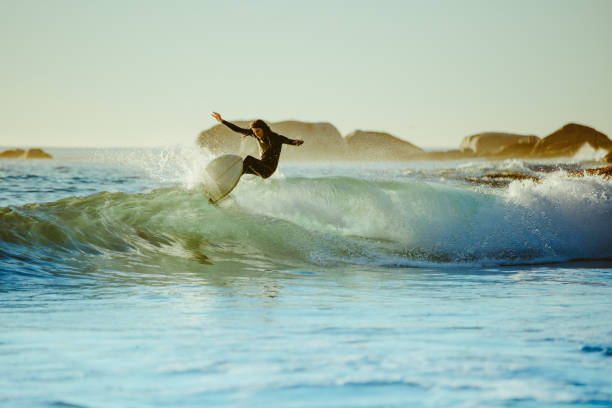 istock Young man water surfing in the sea 1163929149
