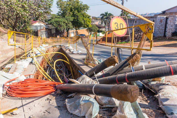 istock New Electricity Power Cables Road Trench Installation 1163929970