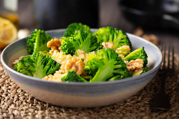 istock Healthy broccoli  quinoa salad with walnuts 1163931996