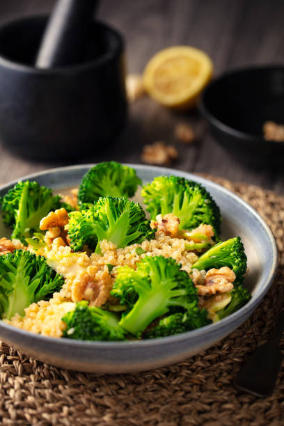 istock Healthy broccoli  quinoa salad with walnuts 1163932002