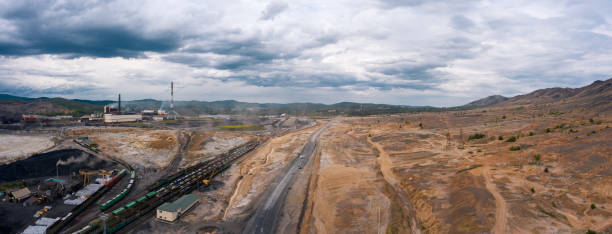 Aerial view; drone moving over the industrial site with polluted area stock photo