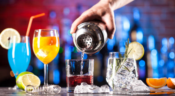 Set with different cocktails on bar tender stock photo
