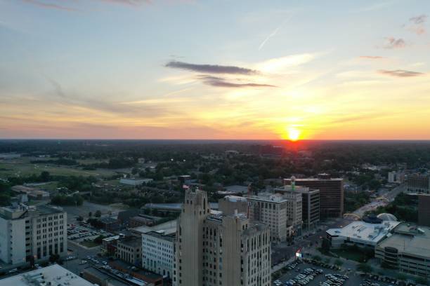 Downtown Flint Sunset capturing the City of Flint to the NW flint michigan stock pictures, royalty-free photos & images