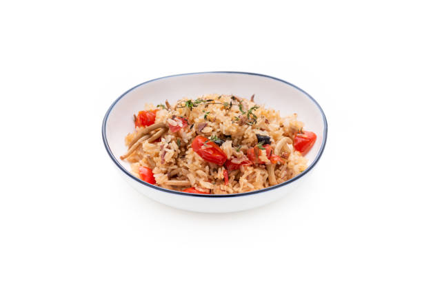 istock fried rice with tomato and mushroom on isolated white background 1163936702