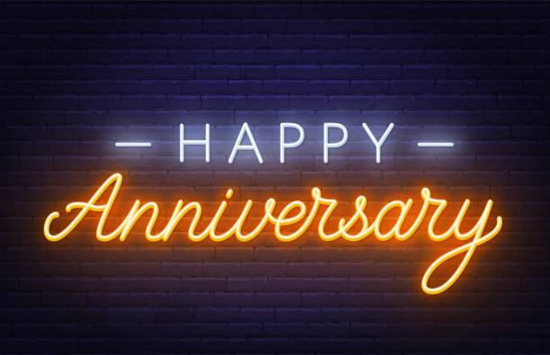 happy anniversary neon sign. kartka z życzeniami na ciemnym tle. - metallic wall brick glowing stock illustrations