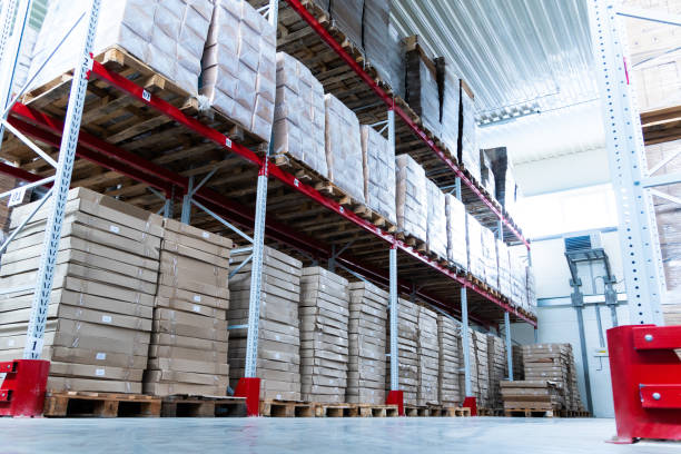 istock storage warehouse and racks on which there are cardboard boxes with finished products 1163939848