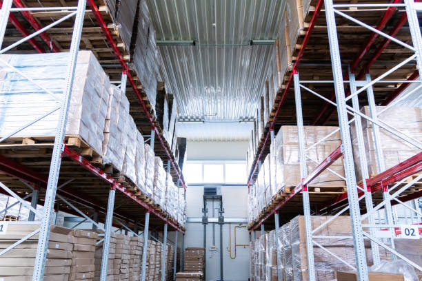 istock storage warehouse and racks on which there are cardboard boxes with finished products 1163939853
