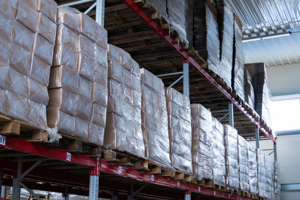 istock storage warehouse and racks on which there are cardboard boxes with finished products 1163939861