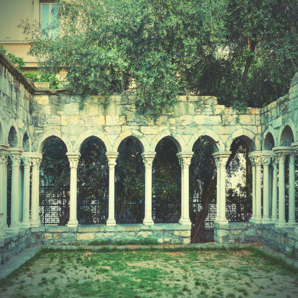 Columns of Chiostro di Sant'Andrea monastery in Genoa (Genova), Italy. Social media vintage style filtered image