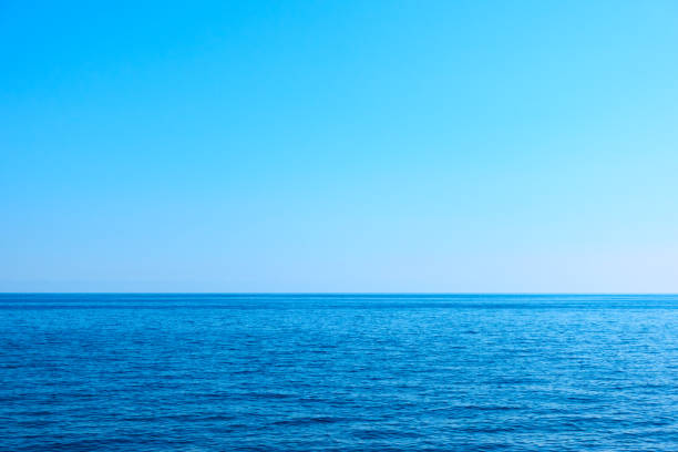 istock Seascape with sea horizon and clear blue sky 1163943043