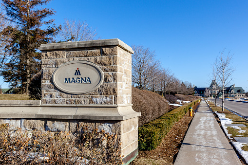 Magna with head office in background in Aurora, Ontario, Canada. Magna International Inc. is a Canadian global automotive supplier.