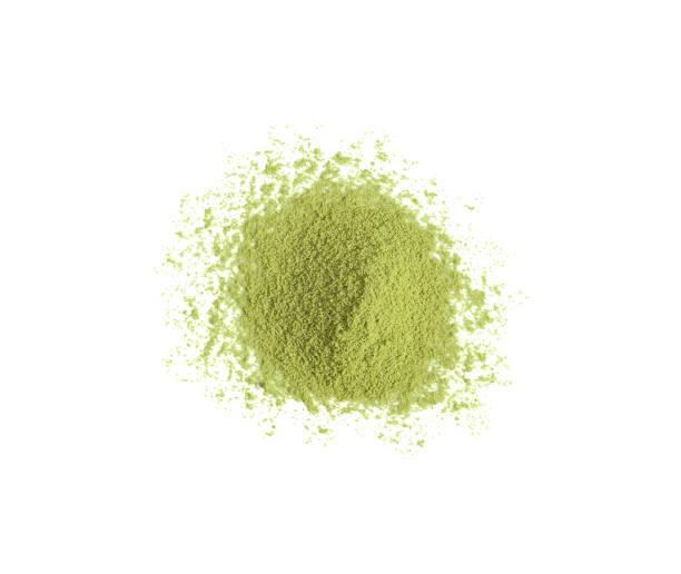 istock green tea powder on white background 1163951020