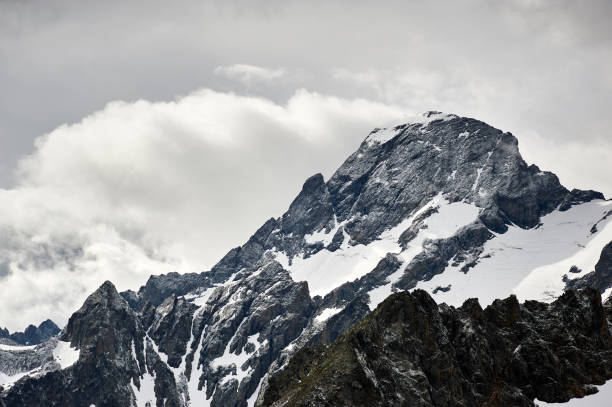 istock Beautiful black summit in clouds. Mountain landscape. Sofia top. 1163954077
