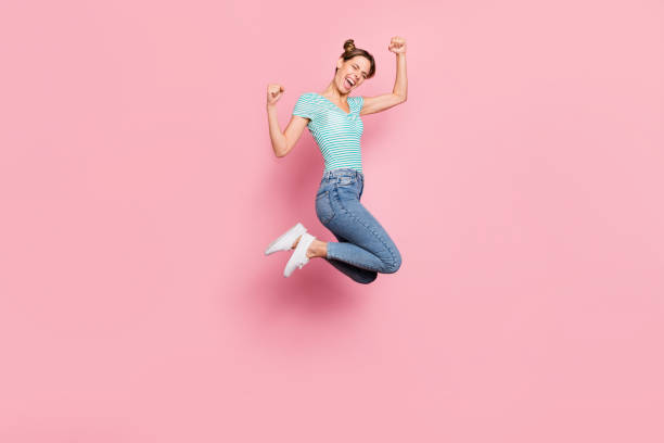 istock Full length body size view of her she nice lovely charming slender thin funny funky crazy playful cheerful cheery girl having fun rejoicing isolated over pink pastel background 1163954151