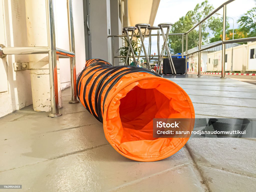 Tube Fan With Confined Space Portable Ventilation Fans And Exhaust Fans  From Exit Door To Outdoor Stock Photo - Download Image Now - iStock