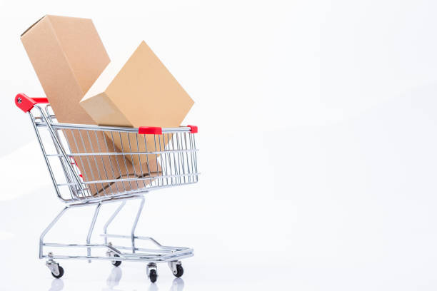 istock Shopping cart with packages 1163956153
