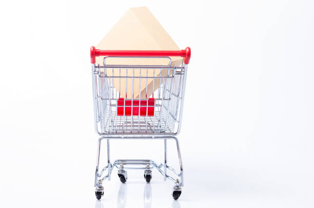 istock Back of a shopping cart with parcel 1163956210