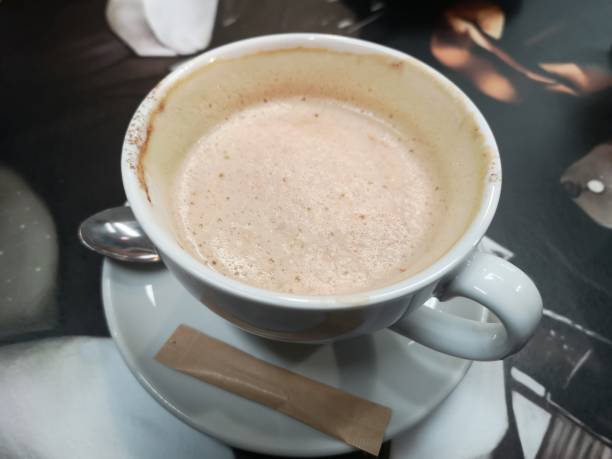 istock Close-up of cappuccino on the table 1163958470