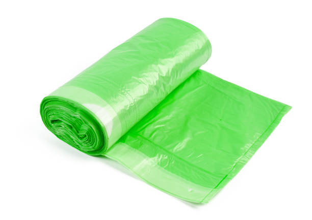 istock roll of plastic garbage bags isolated on white background 1163961347