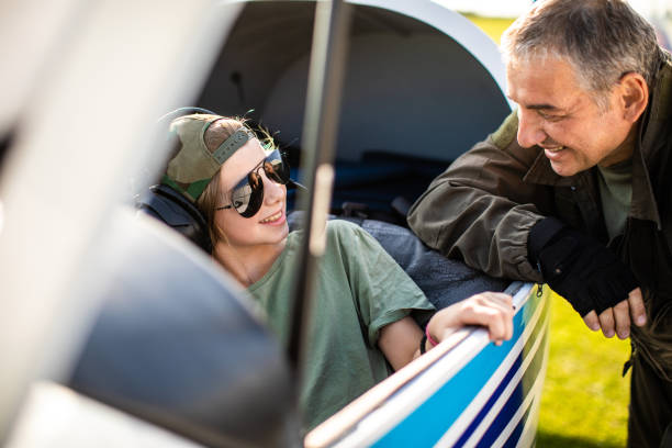 istock Father pilot teaching his daughter how to be a pilot 1163963945