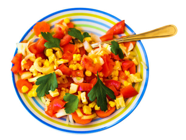 istock Tomato and corn salad with cheese, onion and Italian parsley 1163964840