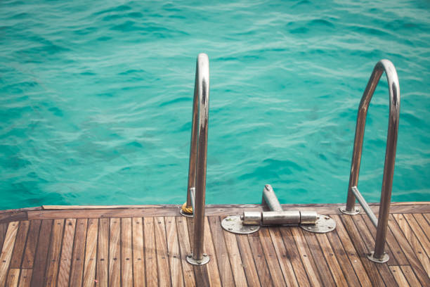 istock Yacht deck and blue sea water 1163966137