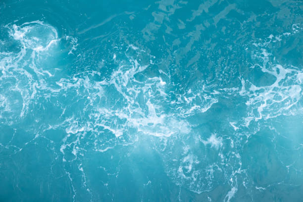 istock Sea Waves in ocean wave Splashing Ripple Water. Blue water background. 1163966968