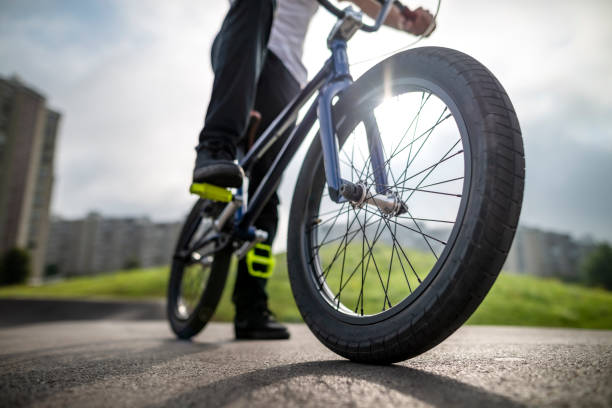 istock Man`s legs on the bmx bicycle 1163967871