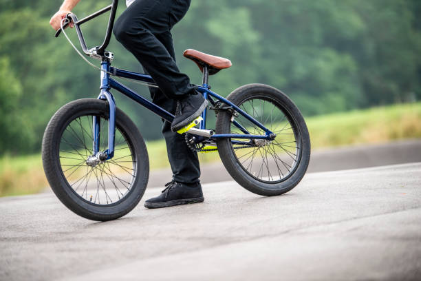 istock Man`s legs on the bmx bicycle 1163967878
