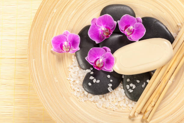istock zen stone and orchid. spa concept 1163968625