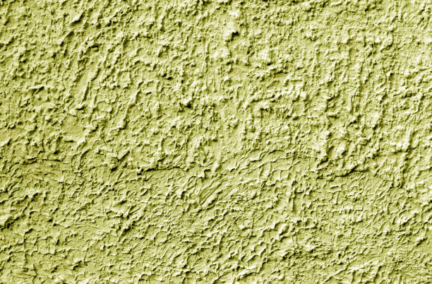 Grungy cement wall texture in yellow color. Grungy cement wall texture in yellow color. Abstract background and pattern for design. 16286 stock pictures, royalty-free photos & images