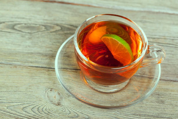 istock Cup of tea on wooden table 1163971371