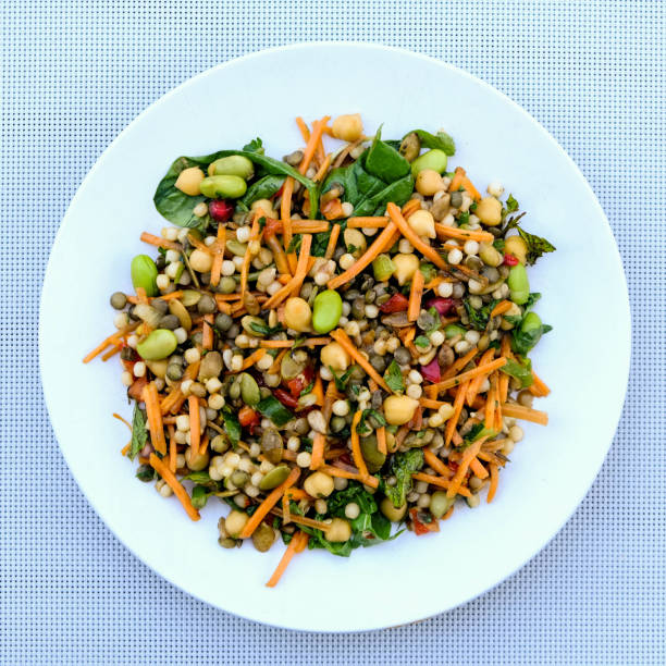 vegetarian summer salad with couscous and edamame beans - green lentil imagens e fotografias de stock