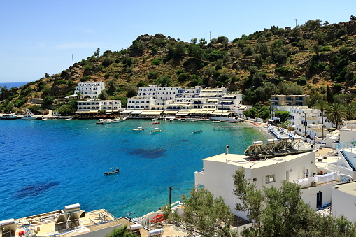 Loutro, Crete island / Greece - May 26 2019: clear water bay of Loutro town on Crete island in Greece