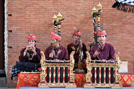 Bali, Indonesia - may 24, 2017: Balinese Gamelan orchestra perform playing traditional ritual music at Art and Culture Festival in Bali, Indonesia