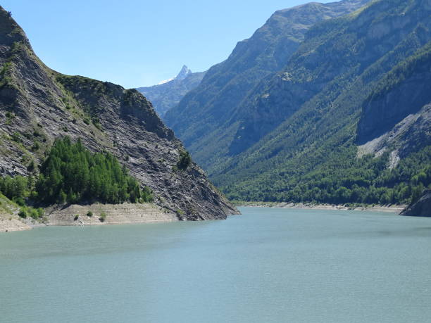 istock Lac de Chambon with la Meije in the background 1163979356