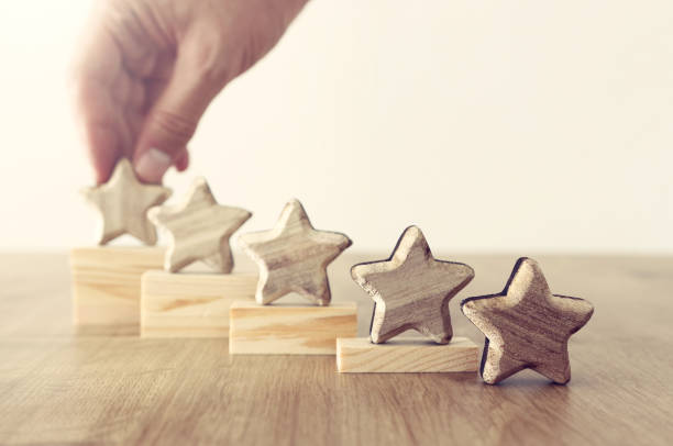 istock business concept image of setting a five star goal. increase rating or ranking, evaluation and classification idea 1163979444