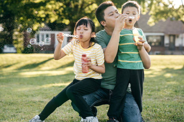 istock Dad and kids outdoor 1163982250