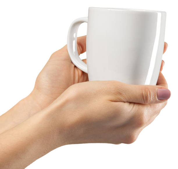 istock Female hands on a white background with a cup 1163984629