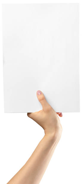 istock hands holding blank paper isolated on white 1163984854