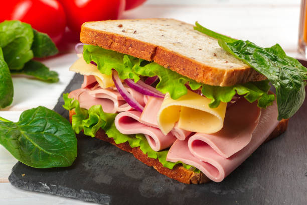 istock sandwich on a wooden table 1163989908