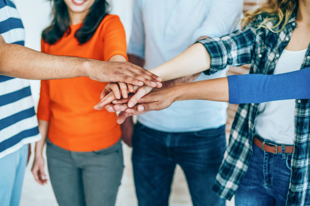 istock Group of friends showing unity 1163990864