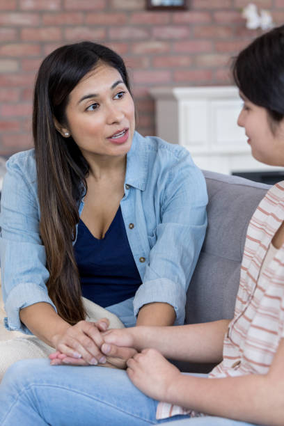 istock Mom has serious talk with daughter 1163991993