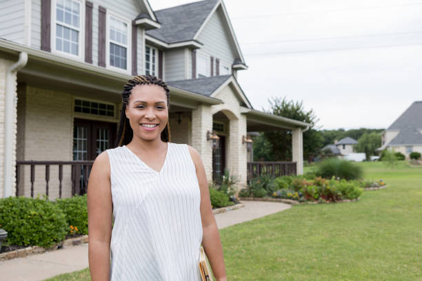 istock Confident female Real Estate Agent 1163992055