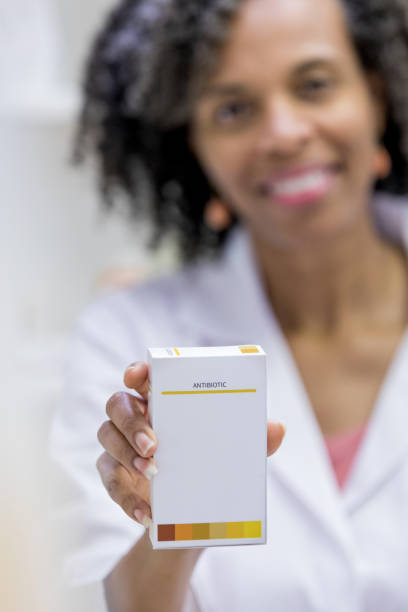 istock Pharmacist holds prescription antibiotic 1163992416